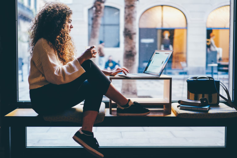 PowerReviews webinar header image of girl looking at computer